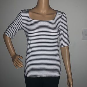 a loves a striped top black and white